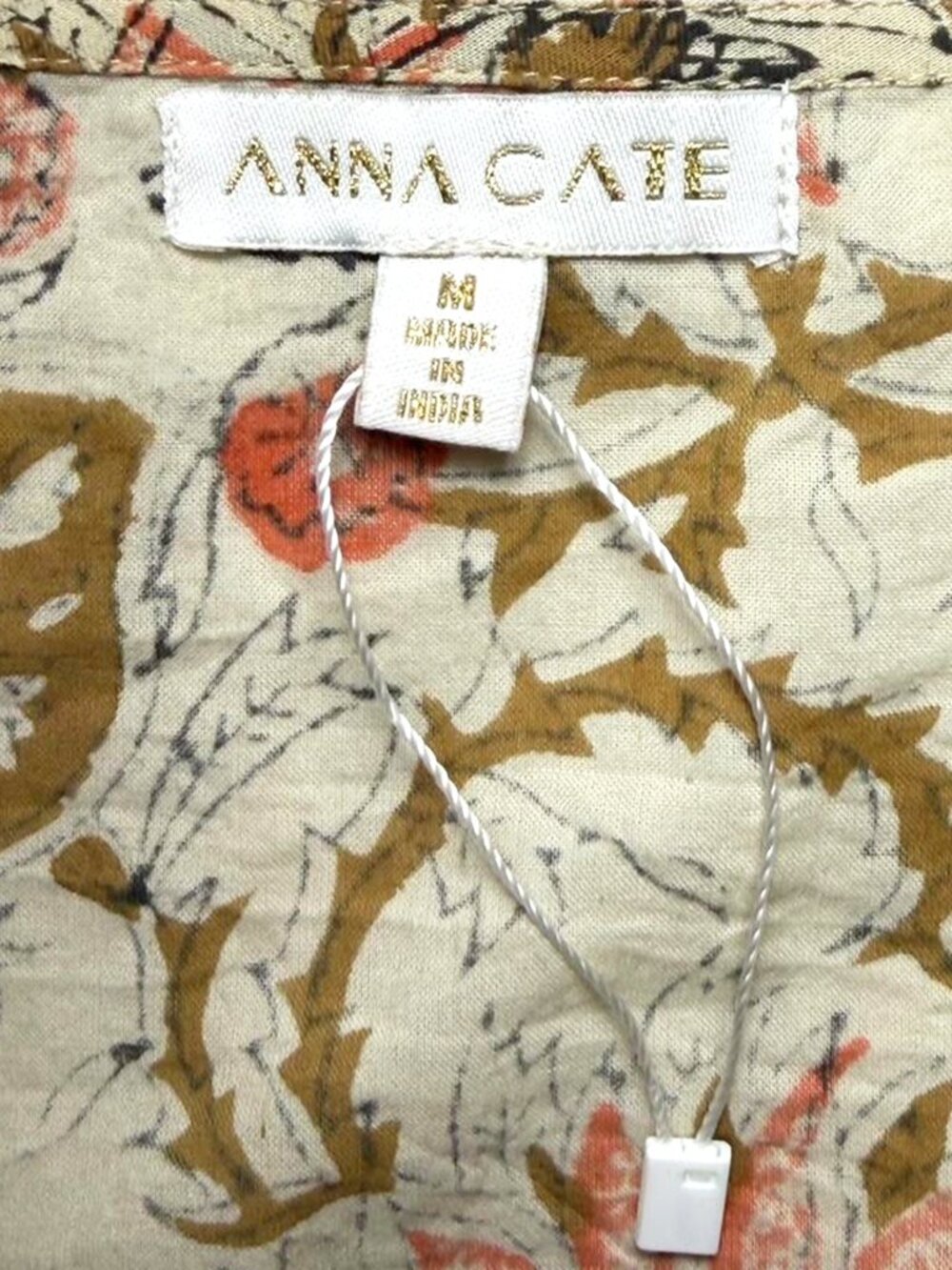 ANNA CATE Kara Puff Sleeve Block Print Peplum Top - Picture 7 of 7